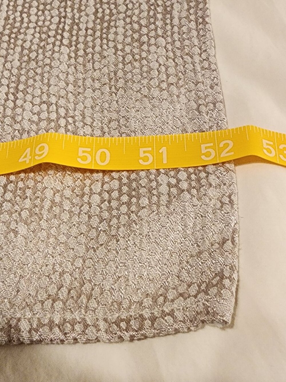 Golden tan colored textured 52 inch X 99 inch table cloth